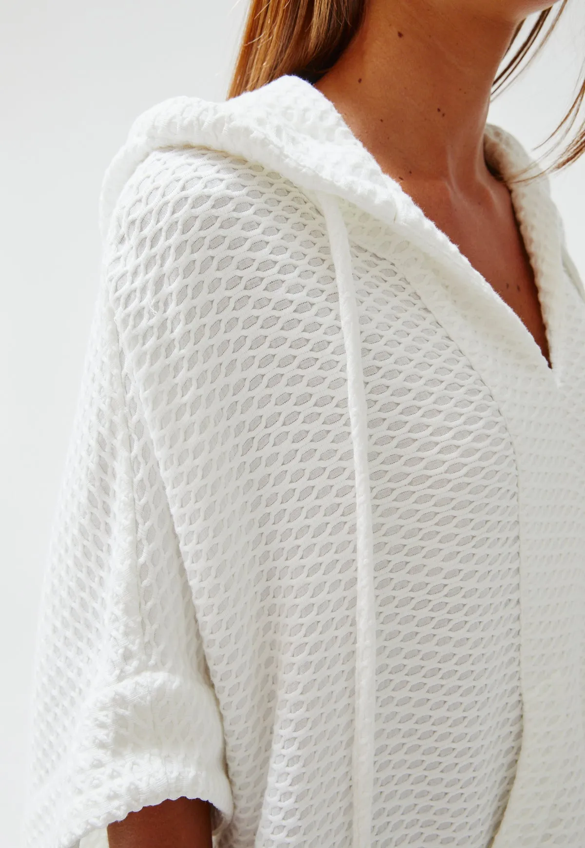 THE HOODED PONCHO in WHITE HONEYCOMB PIQUE